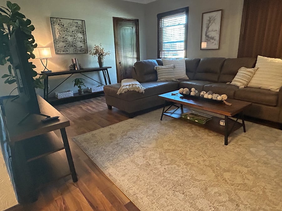 Sink into the large sectional with a pull out queen size sofa bed for all your guests! 