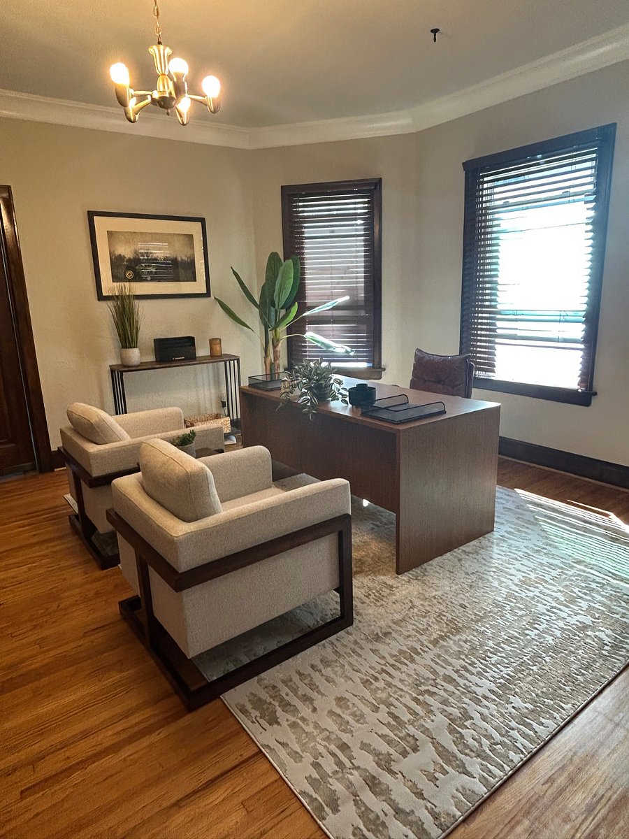 View of your home office from the living room. Includes 2 oversized chairs! 