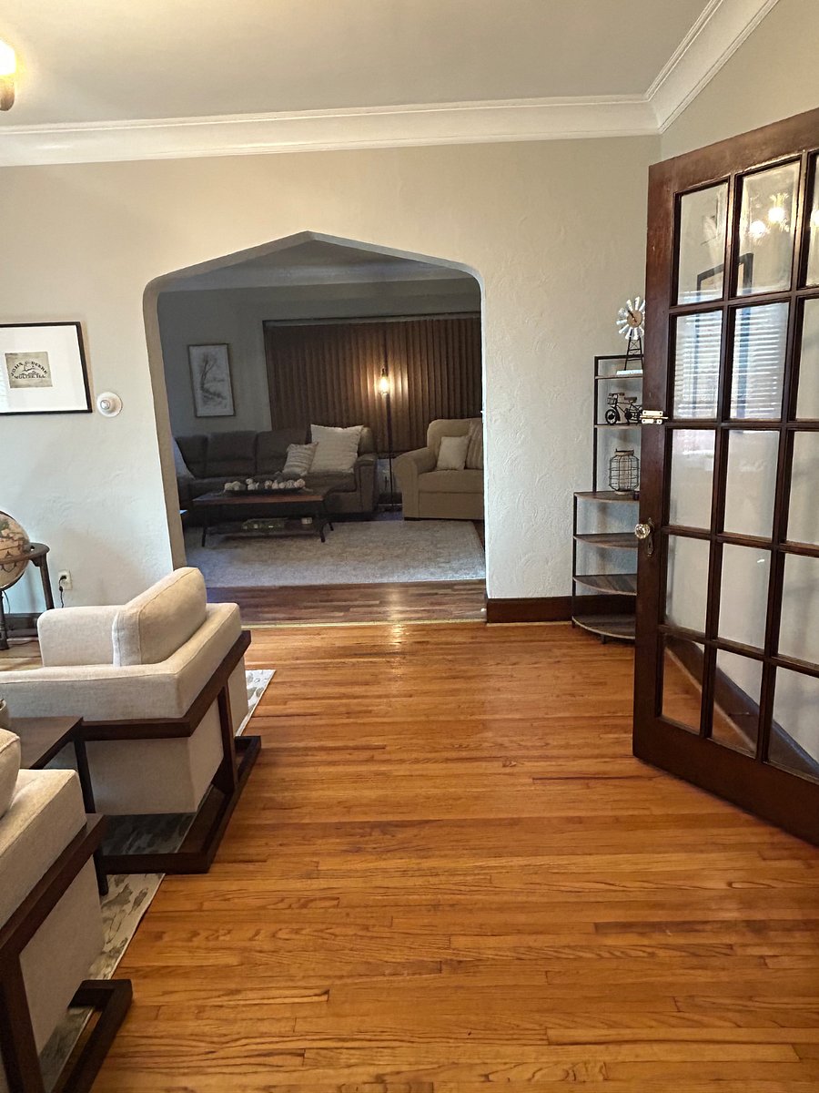 View from the kitchen into the office and bedroom area. You can also see into the large living room from the kitchen via the arched doorways. 