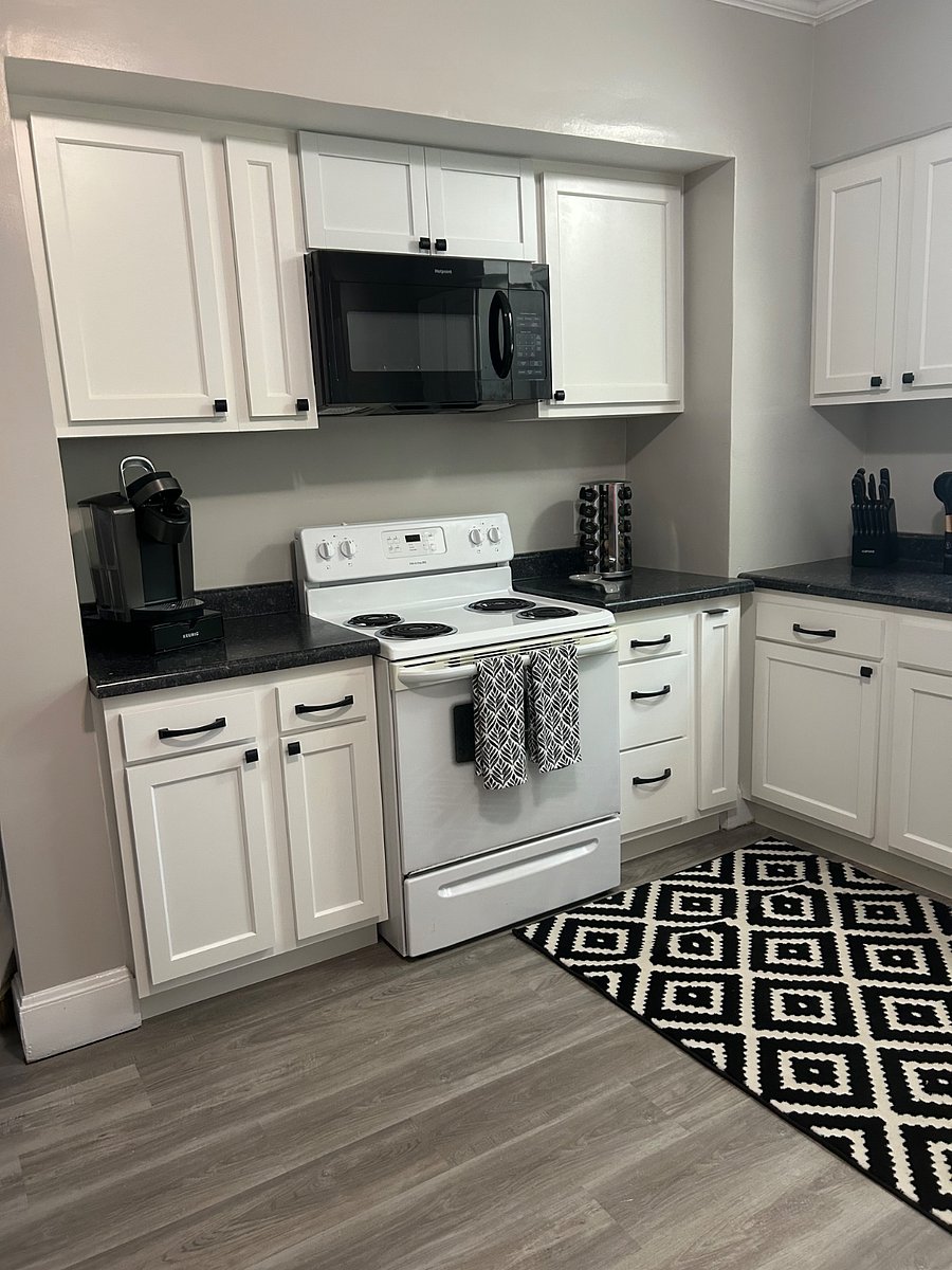 Completely renovated kitchen with brand new cupboards, countertops and flooring! All your kitchen needs are included in the apartment! 