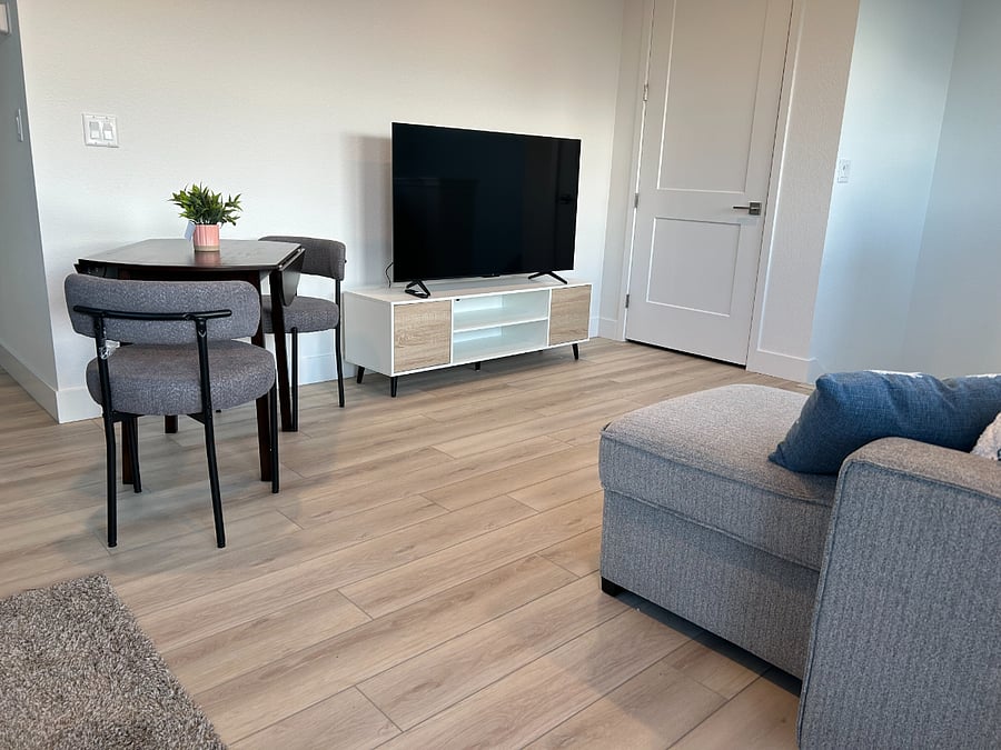 TV included and is connected to wifi for streaming shows. There is also a coat closet for extra storage
