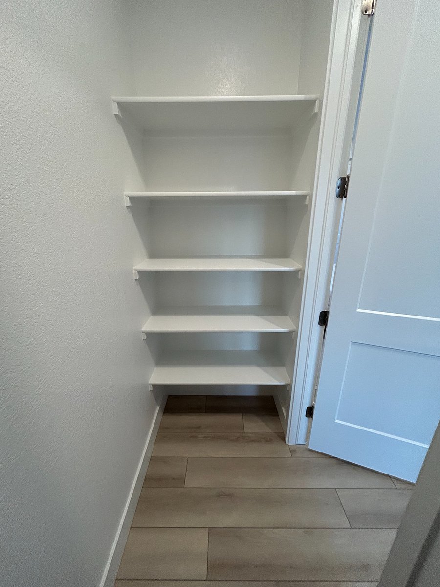 Storage shelves in the laundry room