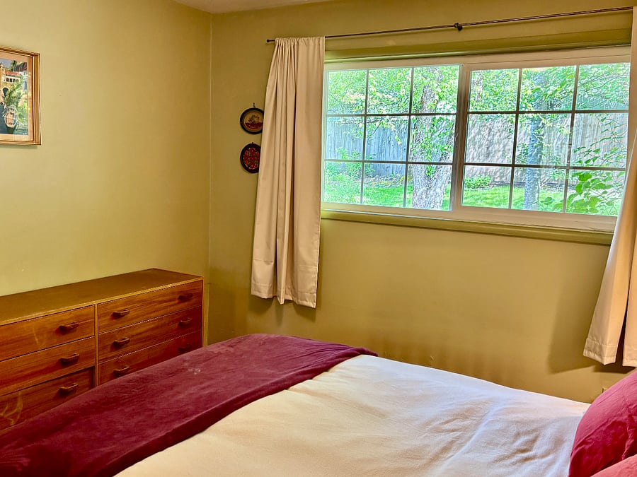 Main bedroom looks out onto the back yard
