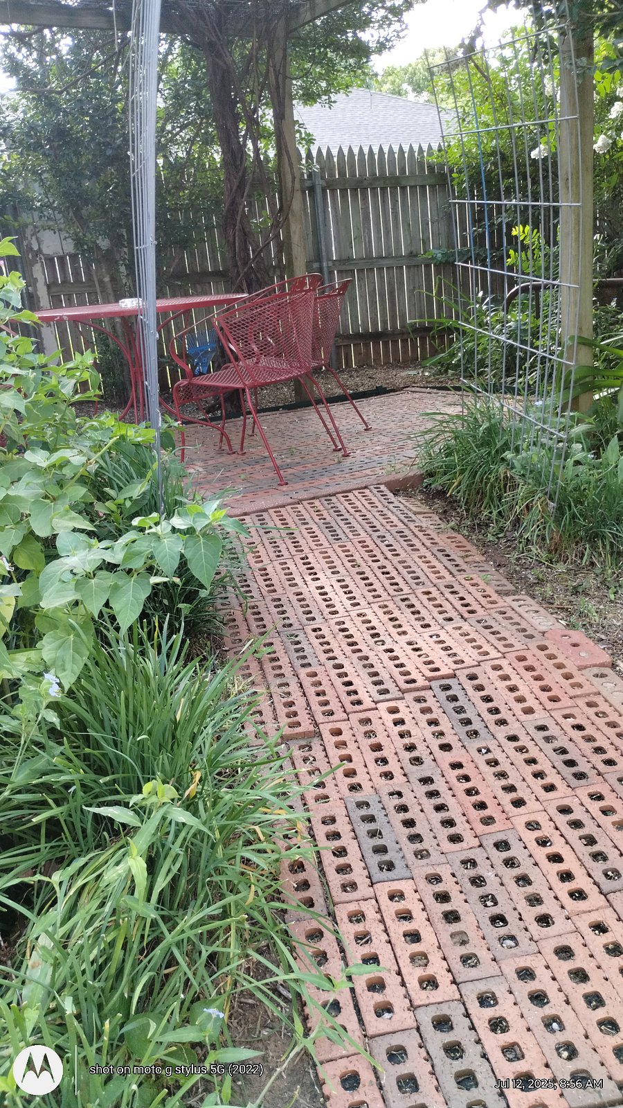 Walk to patio outside the front door of the house.