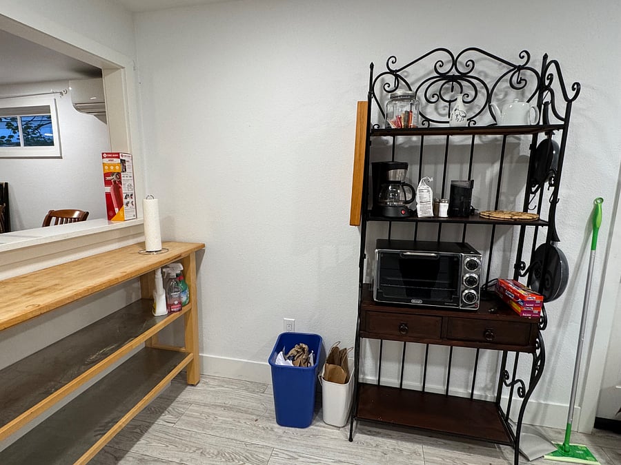 Bakers rack and work table in the kitchen
