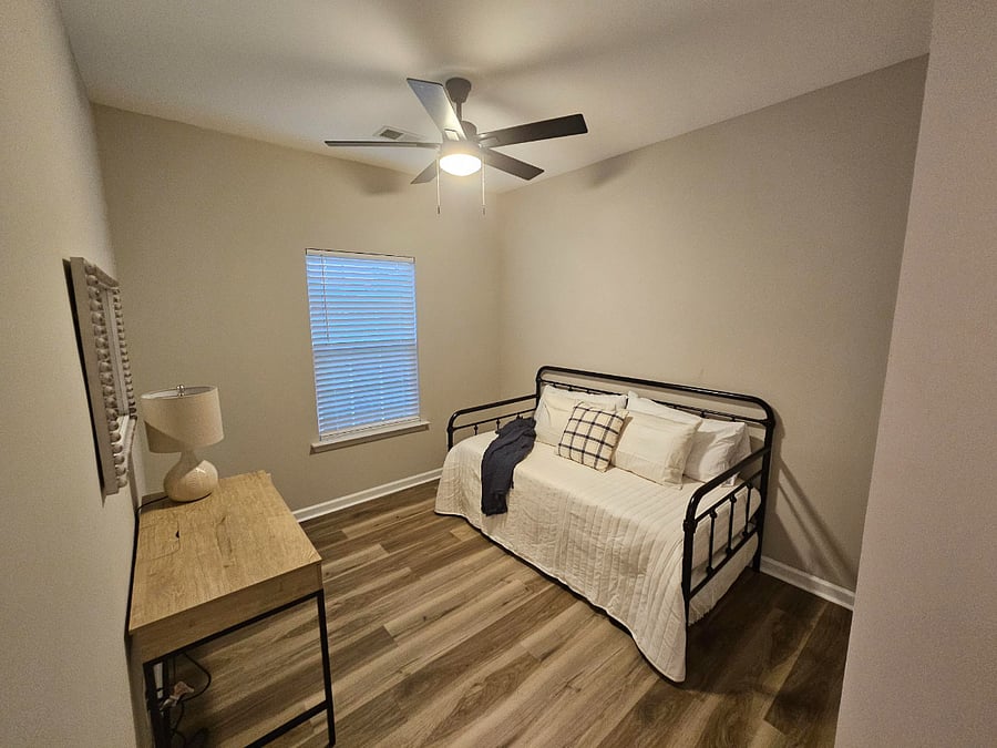 Guest room with workspace.