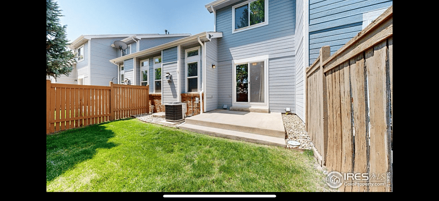 Backyard-Gas BBQ grill included,  dog door is not pictured, but in place for dogs to let themselves out. Lawn maintenance is taken care of by the HOA. 