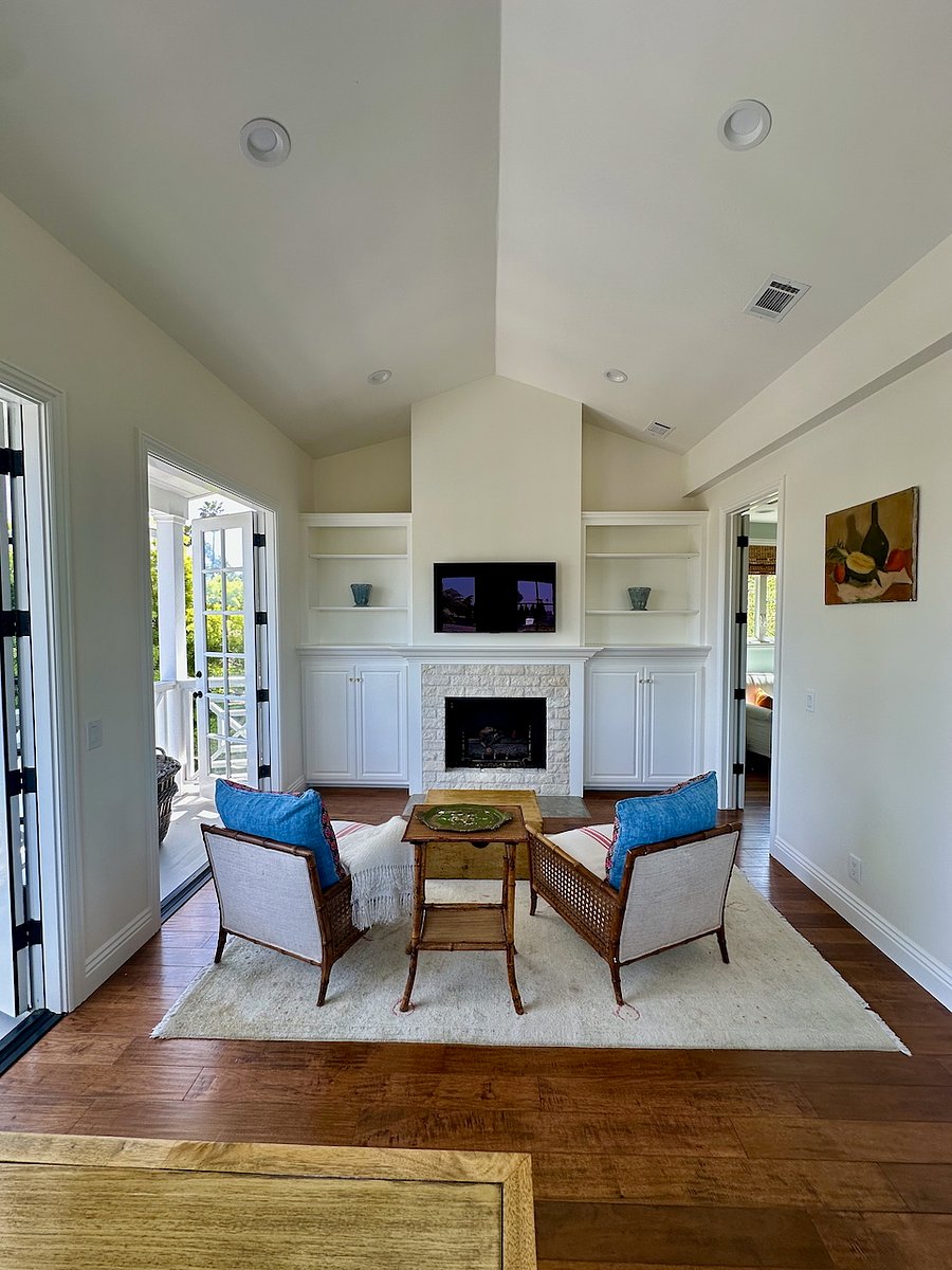Main Room viewing fireplace with mounted LG Smart TV