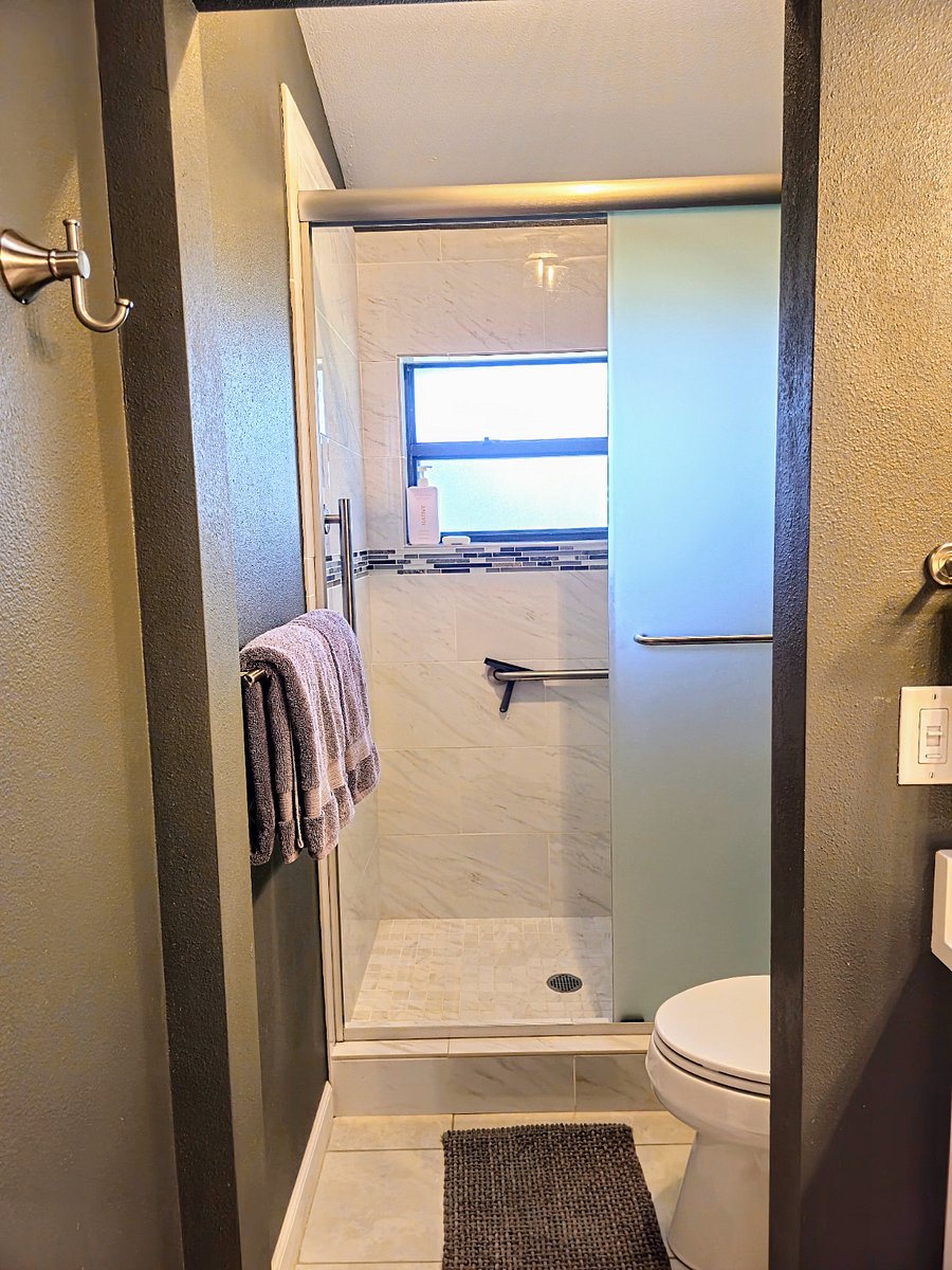 Master Bathroom with tiled shower