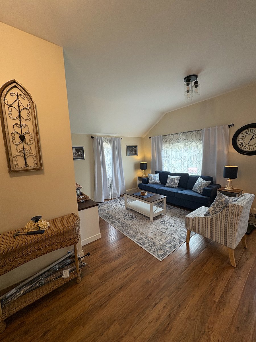 Beautifully furnished living room with smart tv