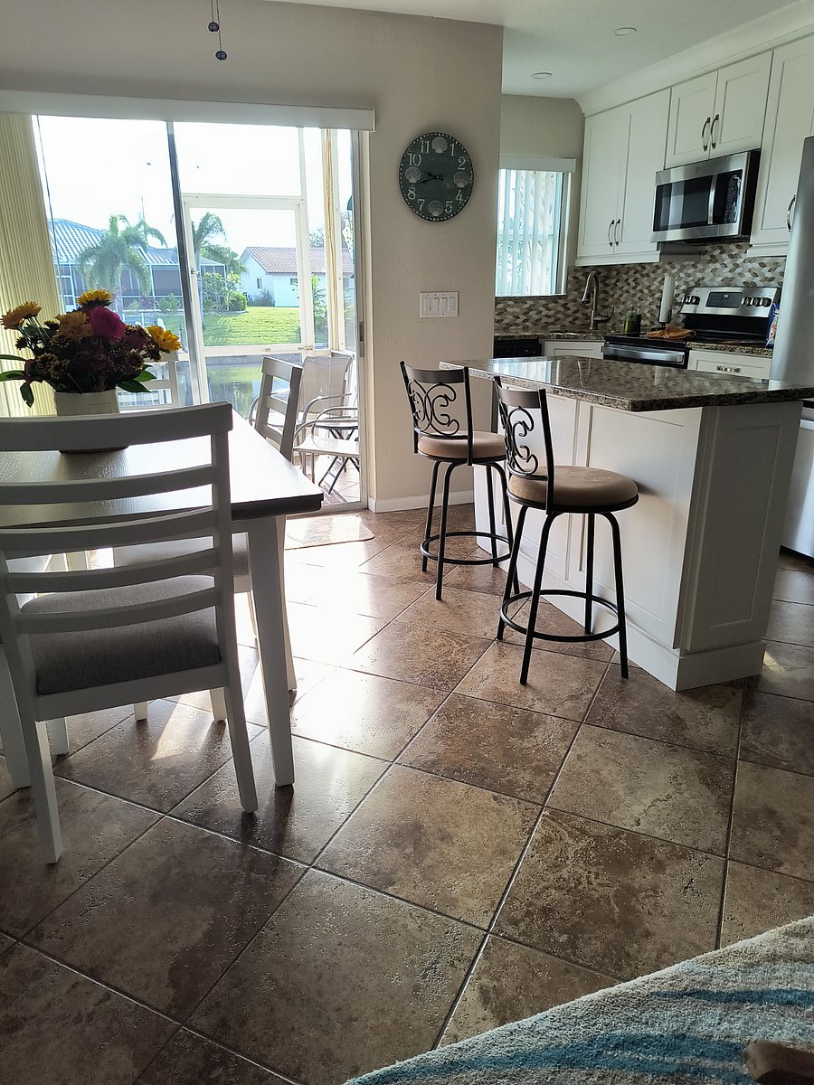 Kitchen area looks out onto the canal area and lanai!