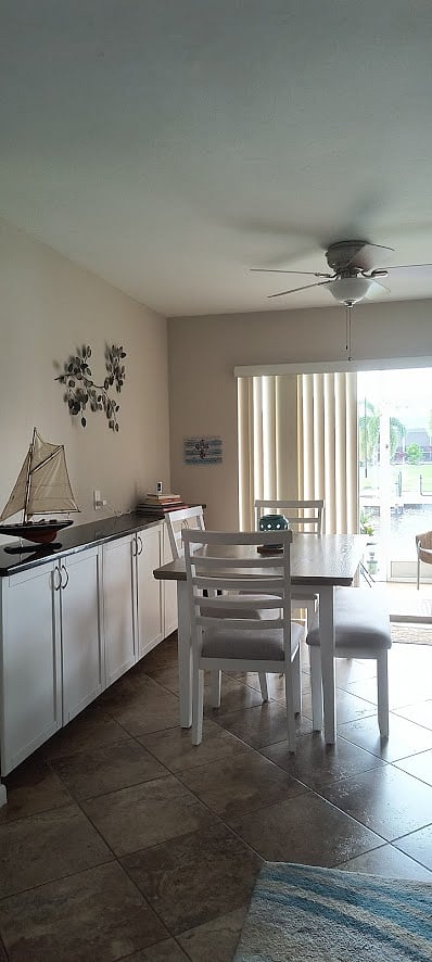 Full dining area overlook lanai and canal