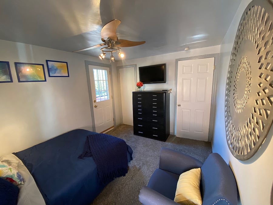 Bdrm2 - Full-sized bed with lounge chair and fire-stick TV