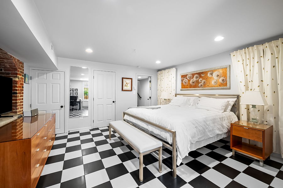 Quiet, large bedroom with 2 built in closets and large mirror.