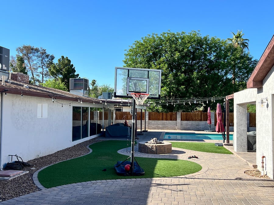 Back Yard, Basket Ball Hoop, Fire Pit and Pool Area.