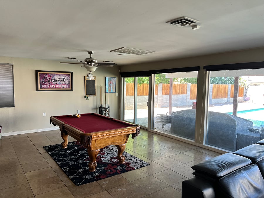 Pool Table in Large Living/Dining Space.