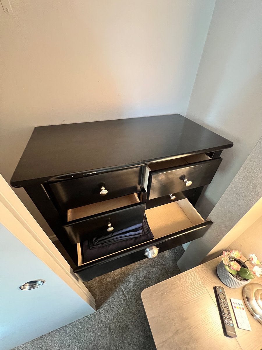 Large Set Of Dressser Drawers Hidden in Closet.
