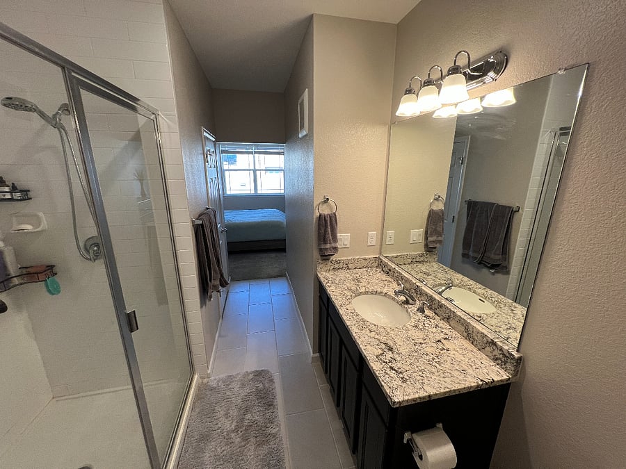 Primary bathroom with walk in shower (built in seat)