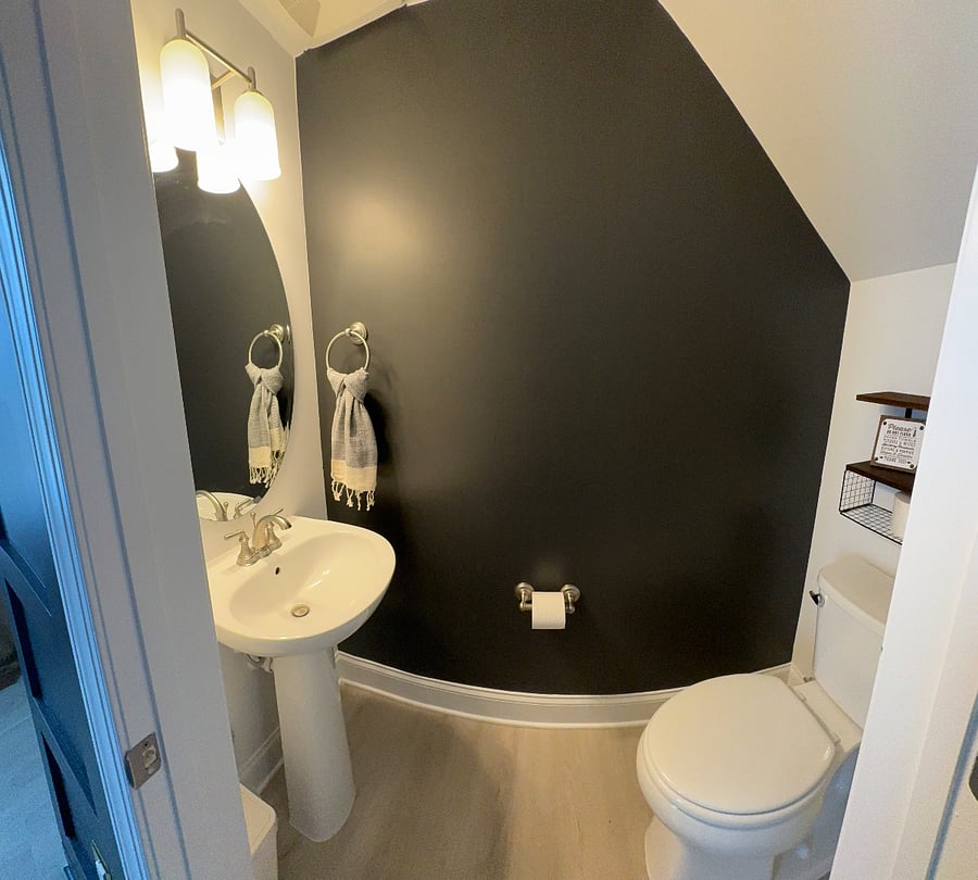 Shared lower level powder room