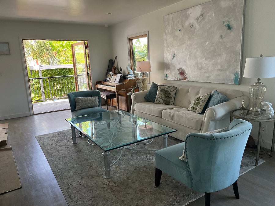 Downstairs sitting area and french Doors to patio