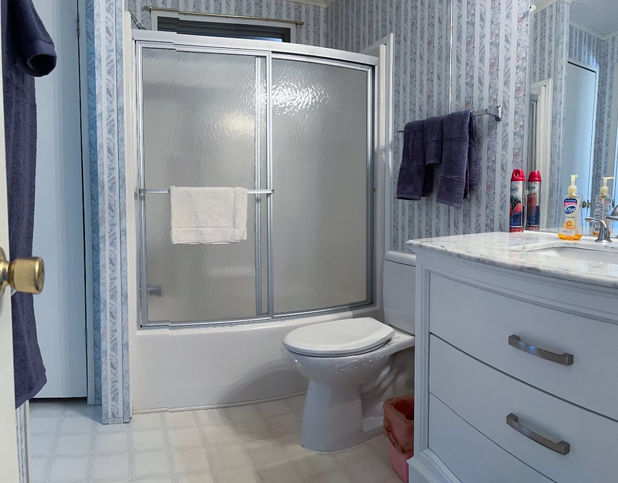 Bathroom with tub and shower