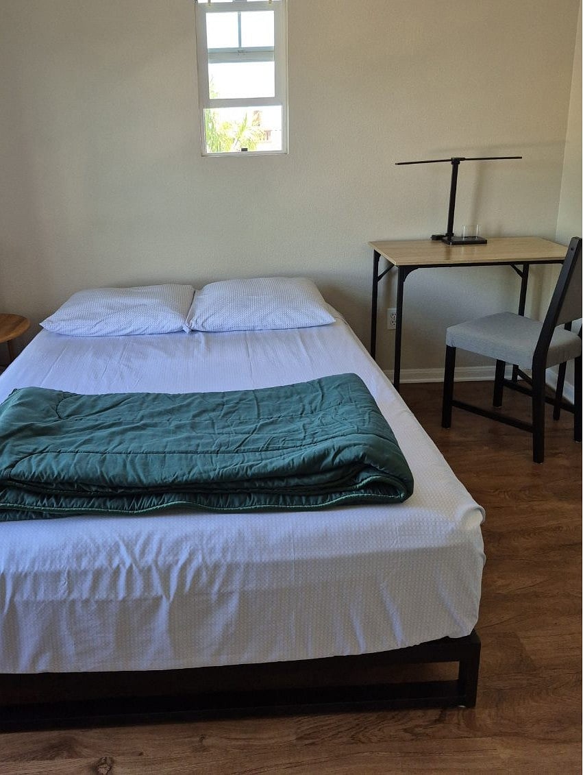 New full / double bed from Costco, night stand and work/ computer desk