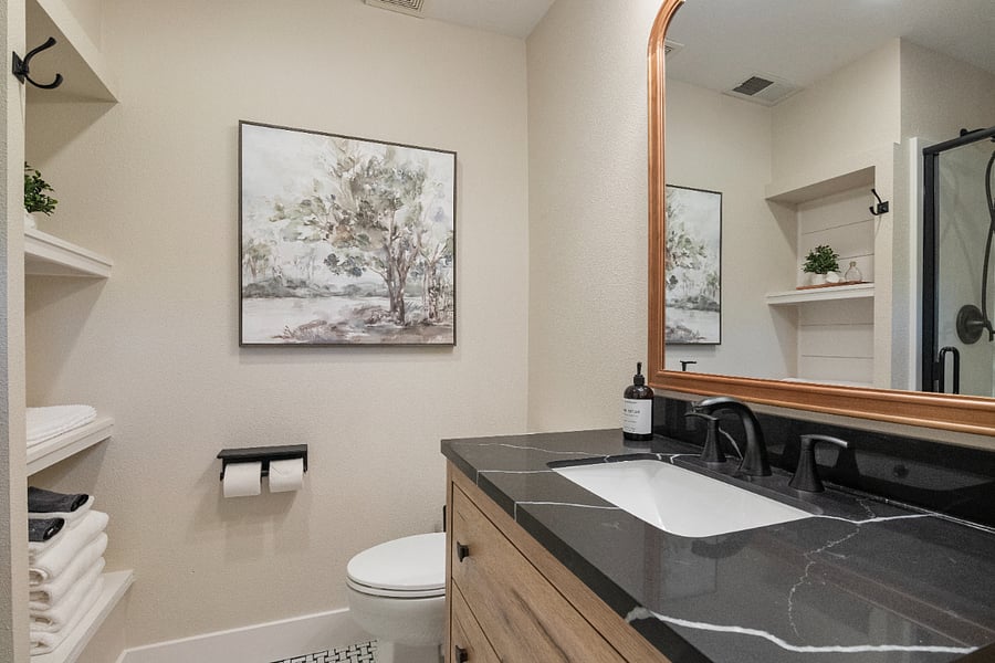 Enjoy the fully remodeled bathroom in the Durant Suite, featuring a spacious walk-in shower designed for comfort, style, and relaxation during your stay.