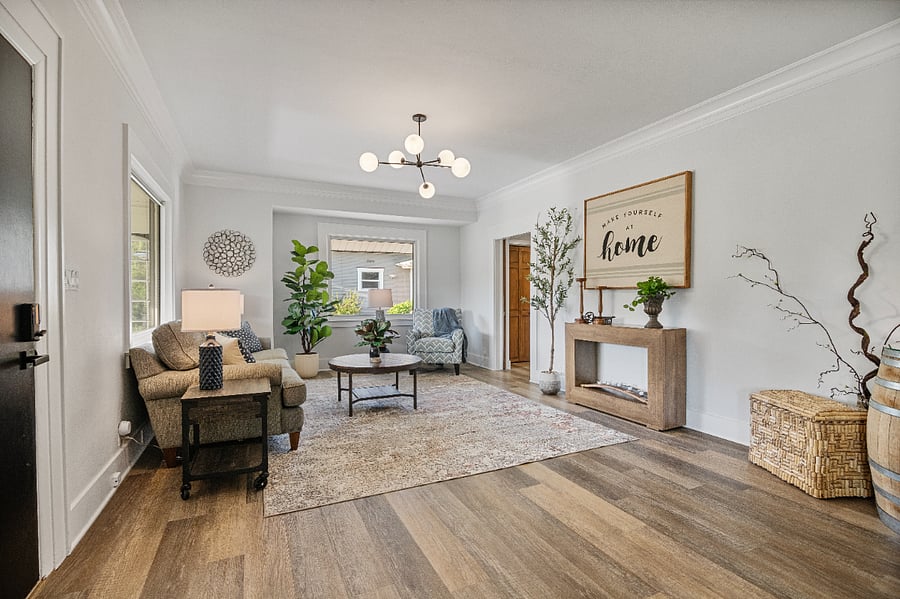 Enjoy relaxing in this cozy living room just inside the front door and off the dining room and kitchen.