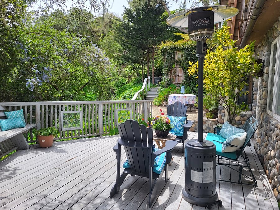 Spacious deck leads to the hot tub.