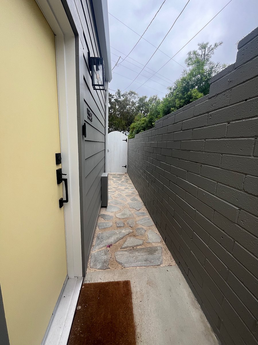 Door to unit with lighted path and keyless entry