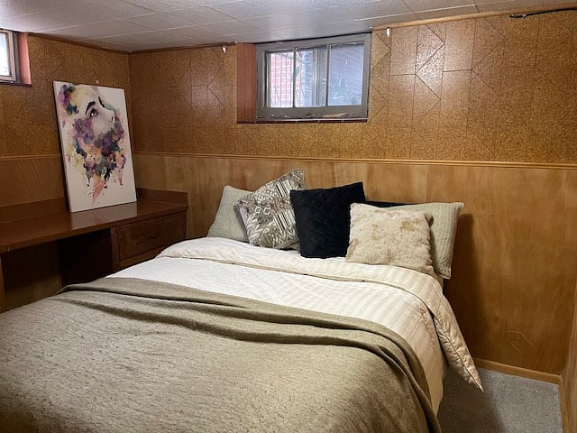 Downstairs bedroom with Queen Bed. Has its own dresser, desk, and closet built in.