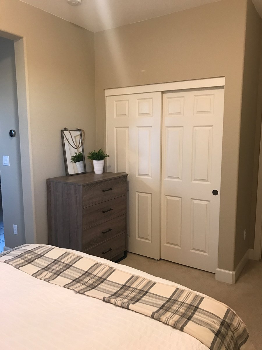 Large closet and dresser offer plenty of storage space.