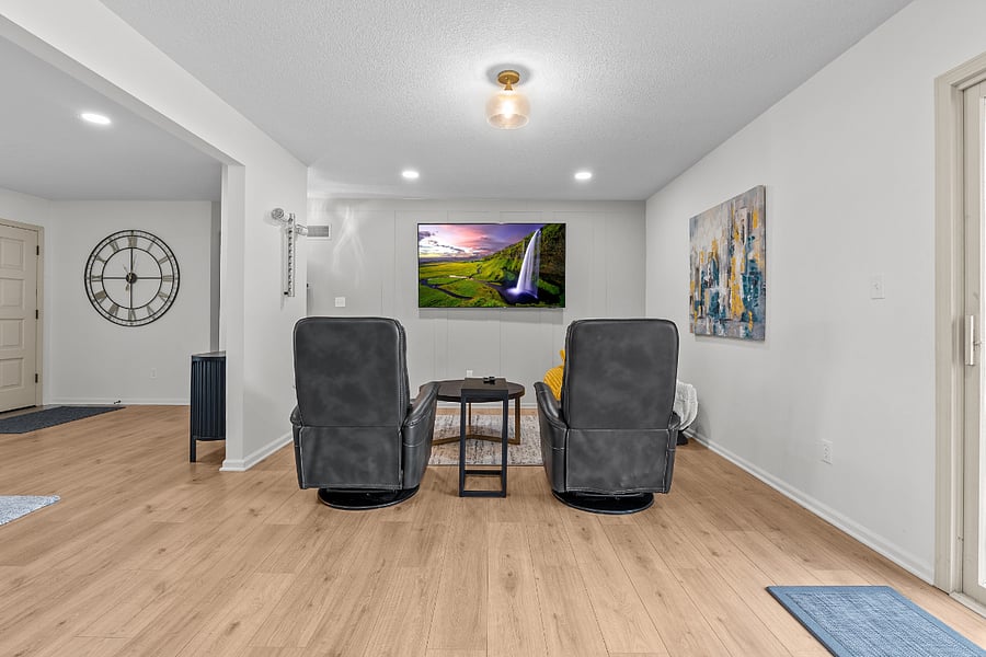 80 inch tv with swivel recliners. Perfect for watching movies or a place to sit while entertaining in the kitchen.