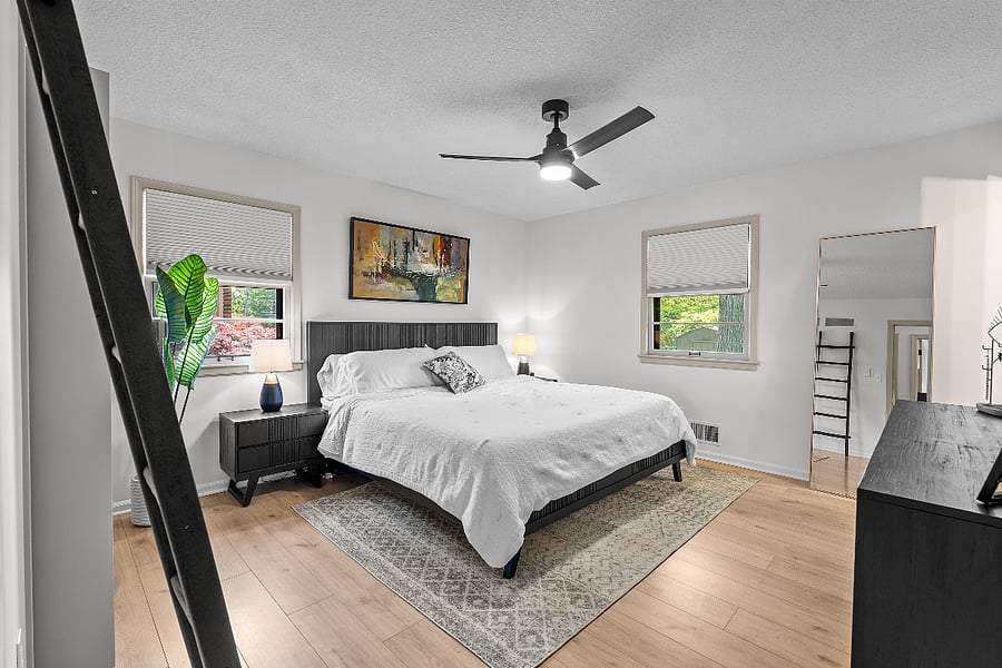 Primary bedroom with king size bed and ensuite bathroom. 2 closets