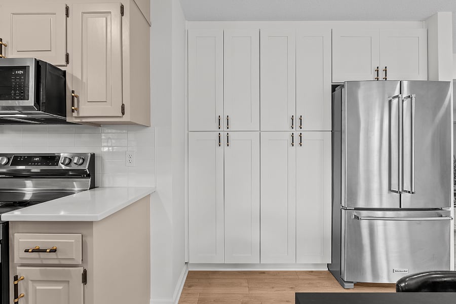 Tons of cabinet space and large refrigerator.