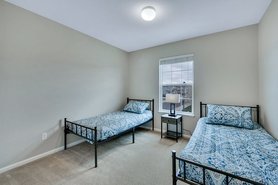 Twin beds in bedroom #3.
