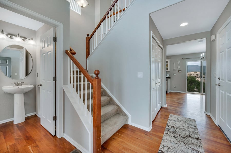 American Cherry wood floor entry on main level with 1/2 bath. Coat closet