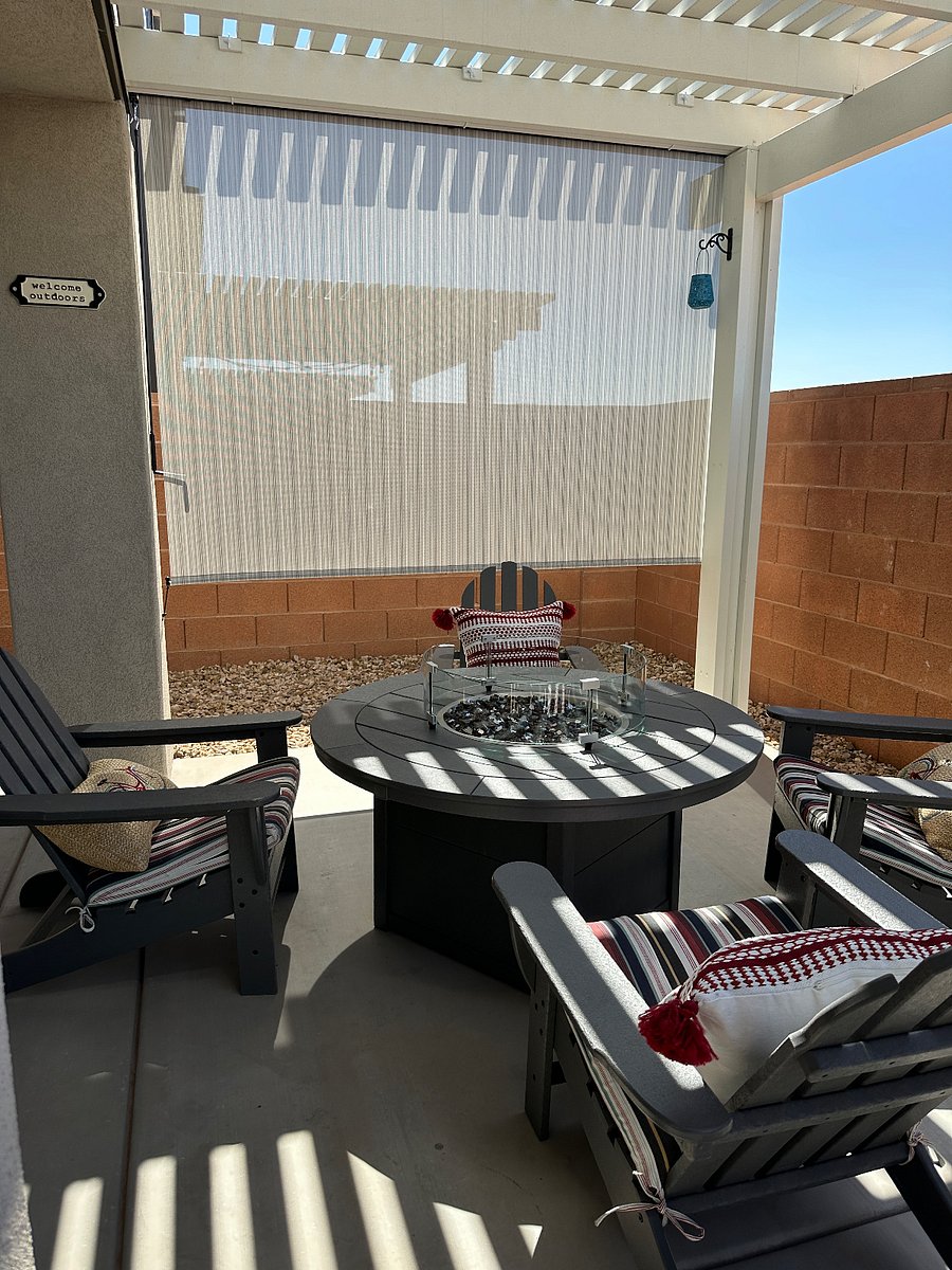 Seating area has roll down shades to offer more privacy as well as extra shade from the afternoon Utah sun.