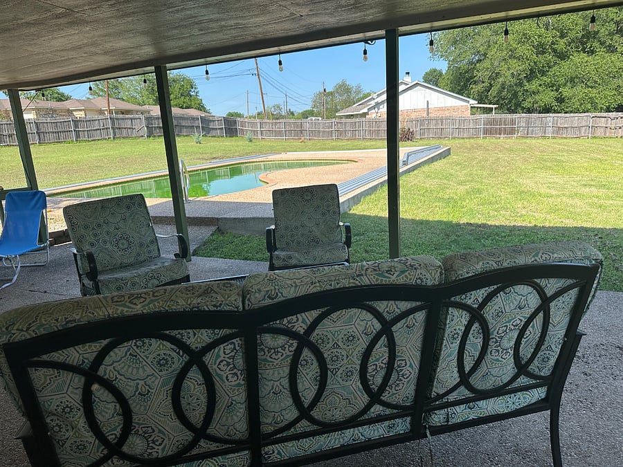 Relaxing back porch with in-ground sport pool available for scheduled use Special Terms.