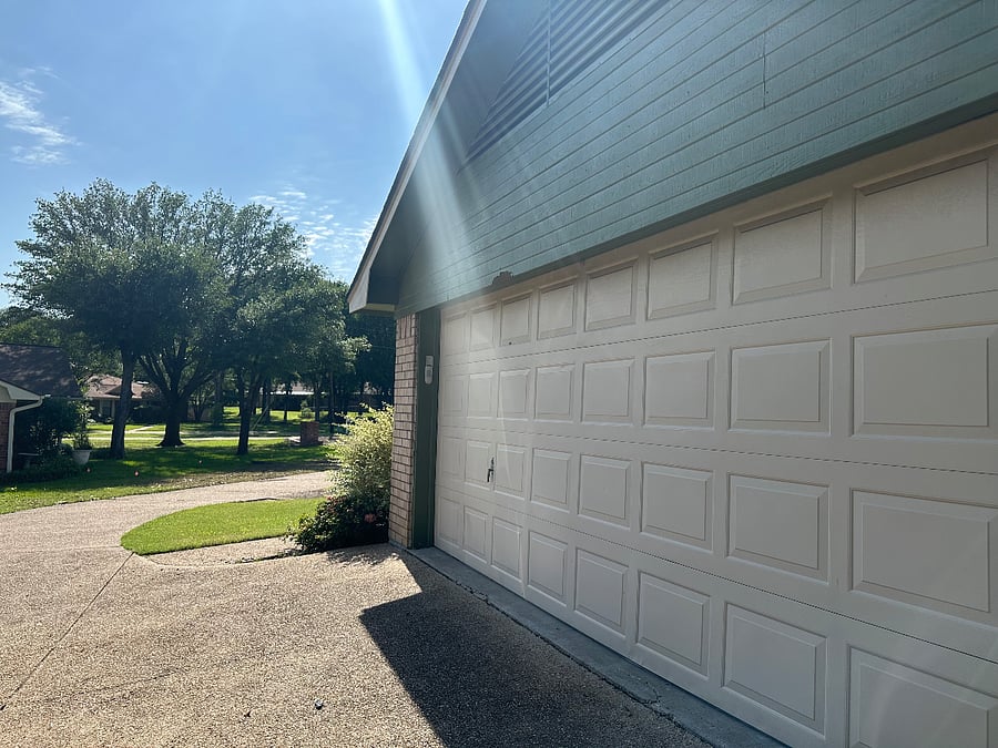 Easy, paved access to double car garage with automatic door opener.