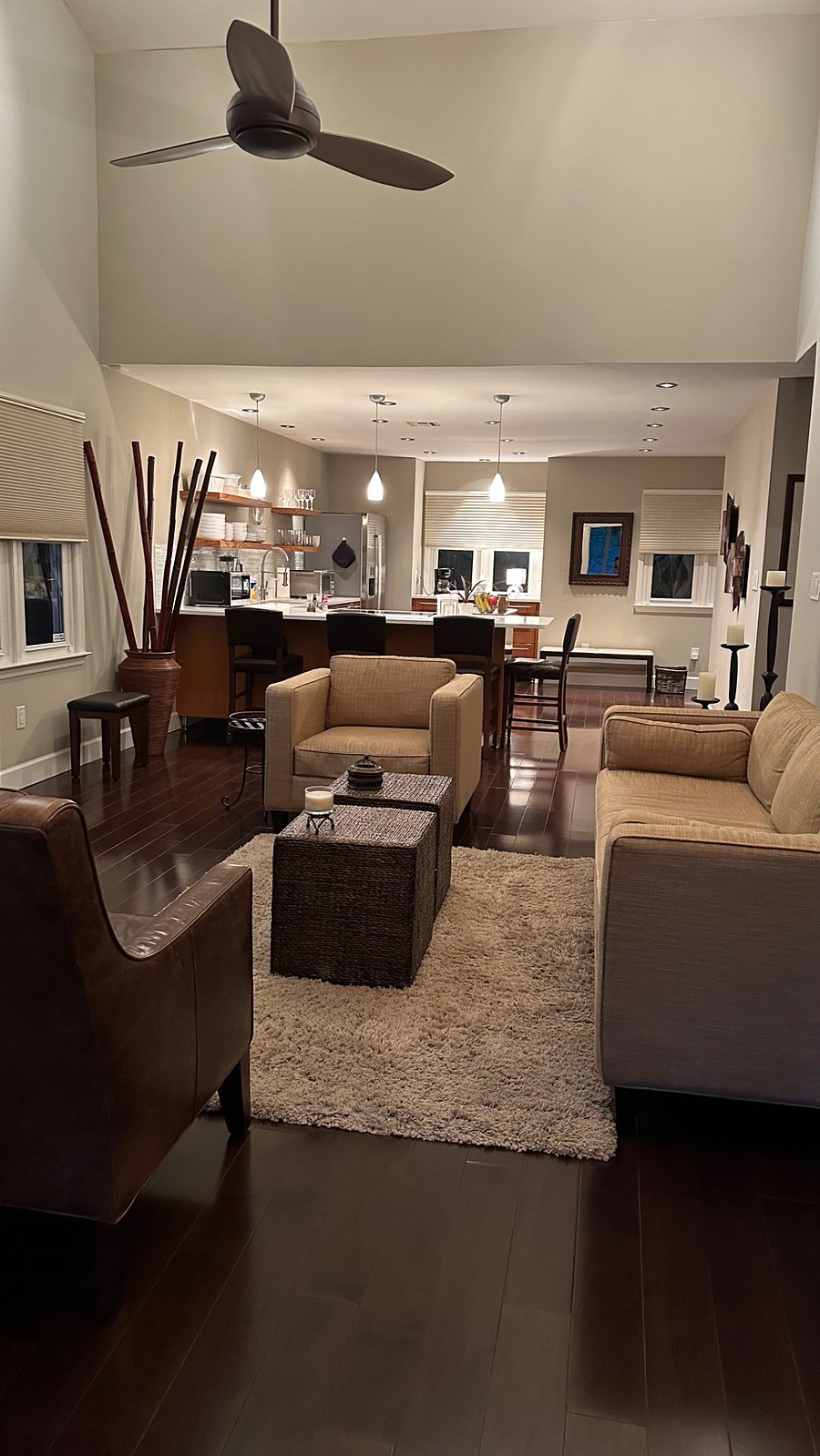Living Room With Kitchen & Dining Area At Night