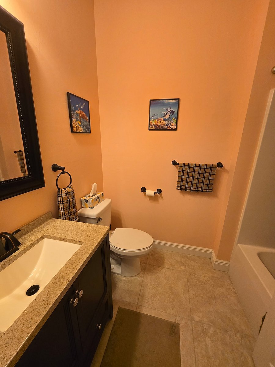Guest bathroom with tub