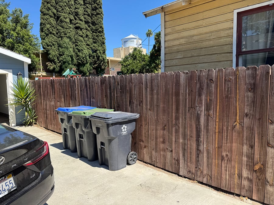 Trash containers must be wheeled to the street curb for collection on Monday mornings