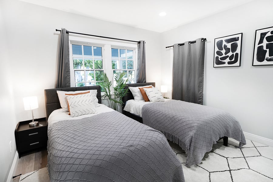 Front bedroom 1 configured with 2 twin beds