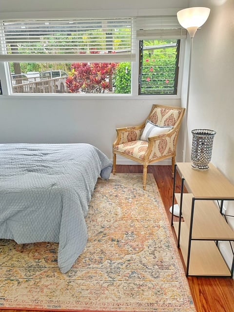Second bedroom has large picture window with louvers on the sides and blinds to close out the light.