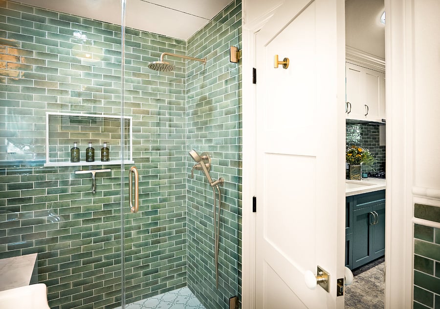 Luxe shower with both waterfall shower head and hand held.