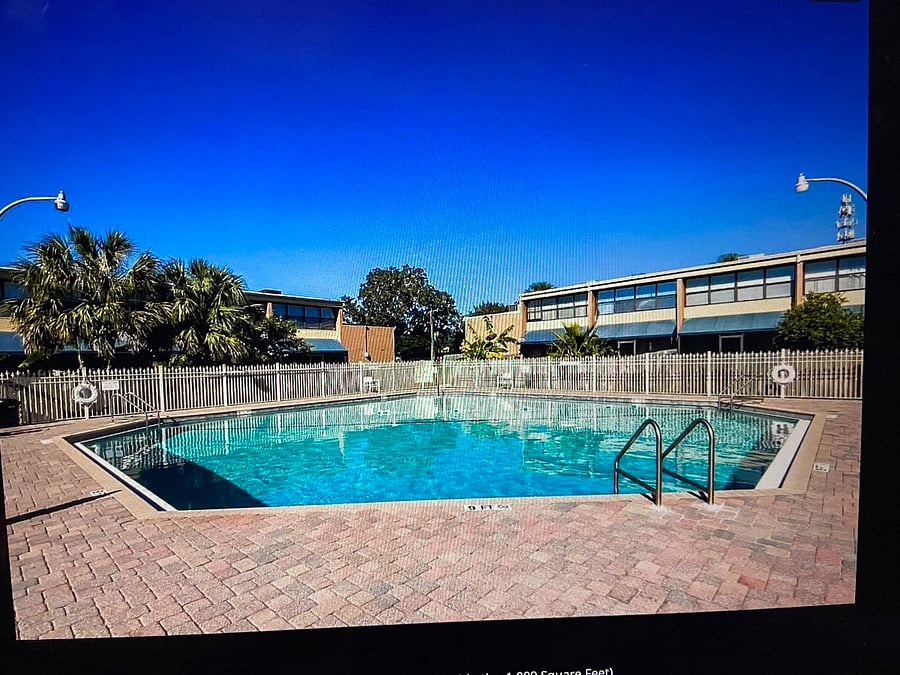 SPACIOUS POOL, ALSO (NOT PICTURED -A CLUBHOUSE WITH SEATING, AND EXERCISE EQUIPMENT AND SAUNA)
