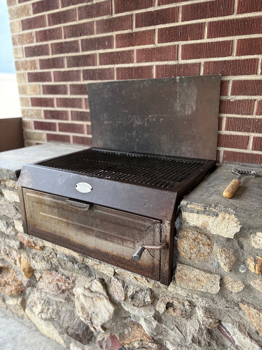 Restored vintage briquette grill.