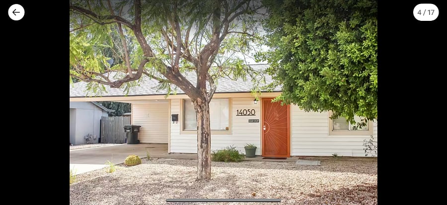 Front of the house. Your private entrance is under the carport.