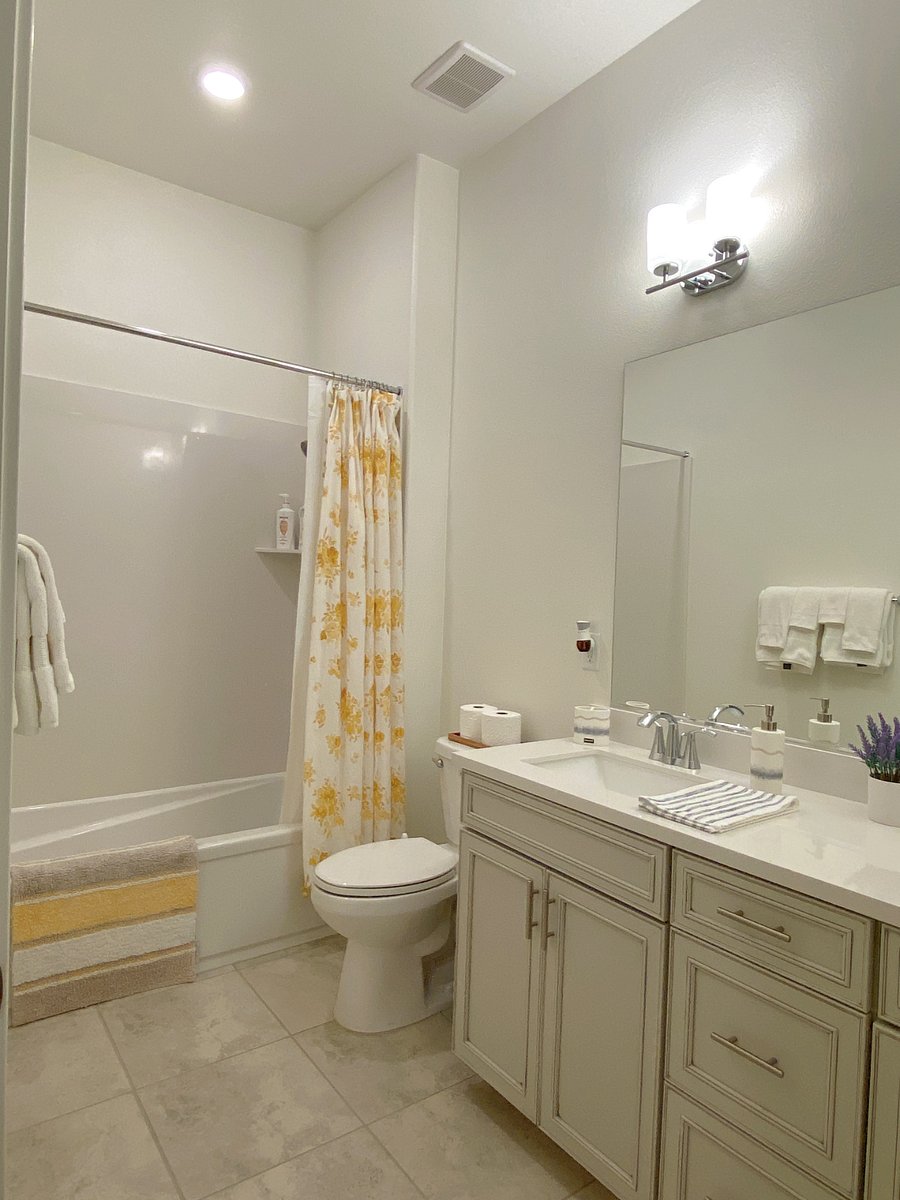 2nd bathroom with dual sinks shared with bedroom 2 and den room